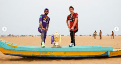 Shreyas Iyer and Pat Cummins pose with the trophy at Marina Beach before the IPL final